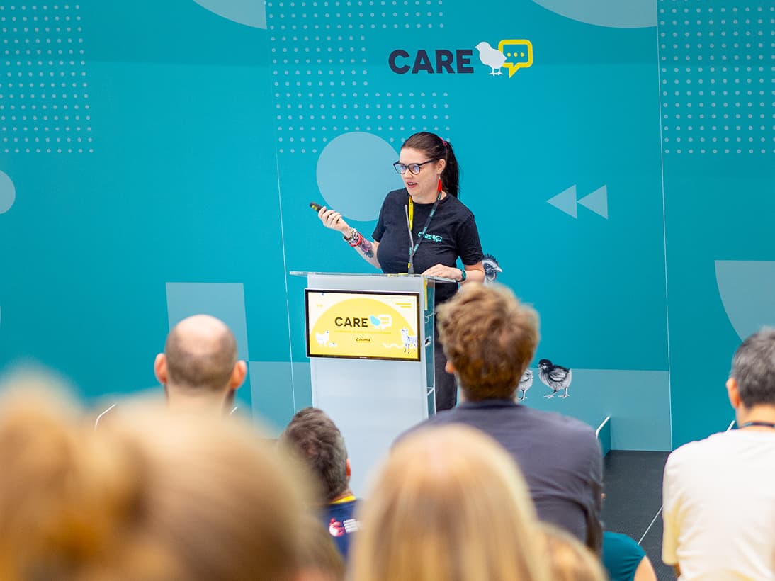 Opening of the CARE Conference - a person talking on a stage